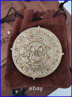 Authentic Pirates of the Caribbean DISNEY AZTEC COIN METAL COASTER RARE 2003