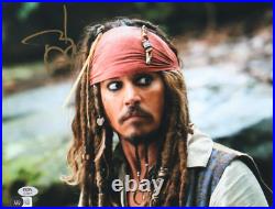 Johnny Depp Signed Pirates of the Caribbean 11x14 Photo (Beckett & PSA)