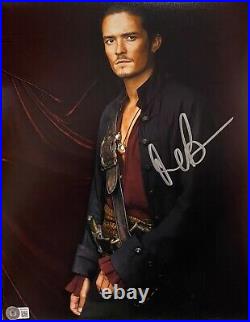 Orlando Bloom Signed 11x14 Pirates of the Caribbean Photo BAS Beckett Witness