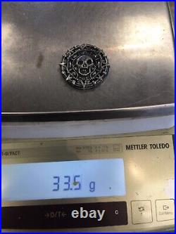 PIRATES OF THE CARIBBEAN CURSED SKULL MEDALLION. 9999 PURE SILVER 33.5g RARE